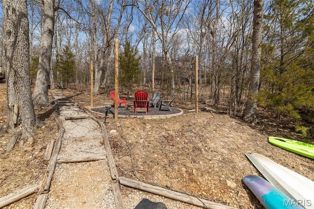 682 Shadow Lake Circle Dr, Innsbrook, MO 63390 - view of yard with an outdoor fire pit