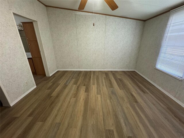65 Bright St, Troy, MO 63379 - spare room with wood finished floors, ceiling fan, crown molding, and baseboards