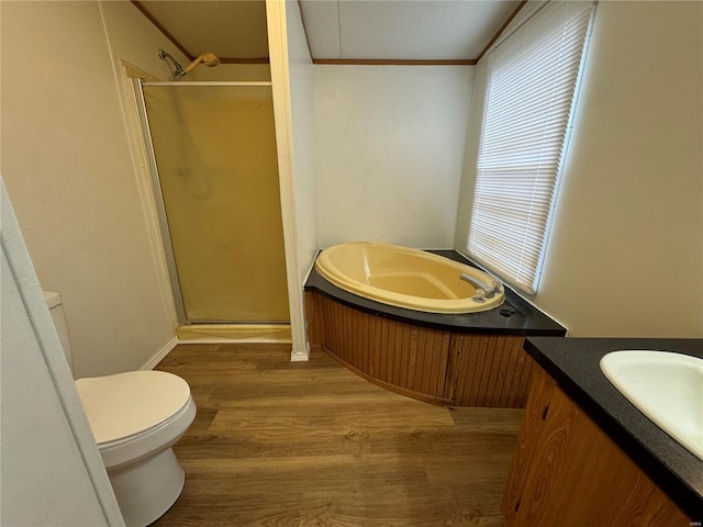 65 Bright St, Troy, MO 63379 - full bathroom with toilet, wood finished floors, a stall shower, a garden tub, and crown molding