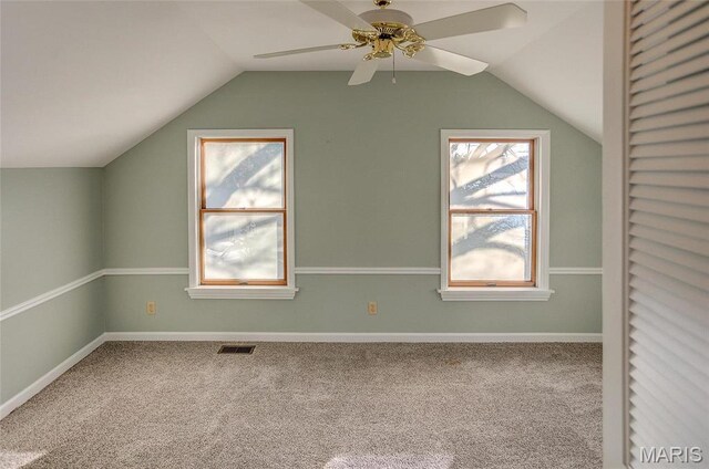 1 Golden Eagle Ferry Rd, Golden Eagle, IL 62036 - additional living space with vaulted ceiling, healthy amount of natural light, carpet floors, and a ceiling fan