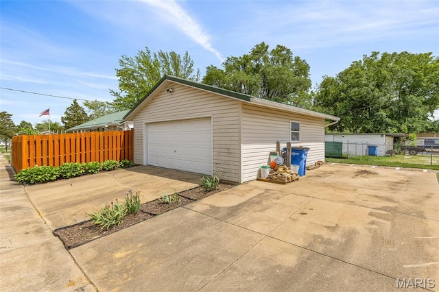 109 N Grant St, Desloge, MO 63601 - detached garage featuring fence and concrete driveway