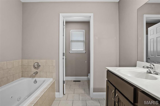 443 Mark Twain Loop, Union, MO 63084 - full bathroom with vanity, a tub with jets, and tile patterned floors
