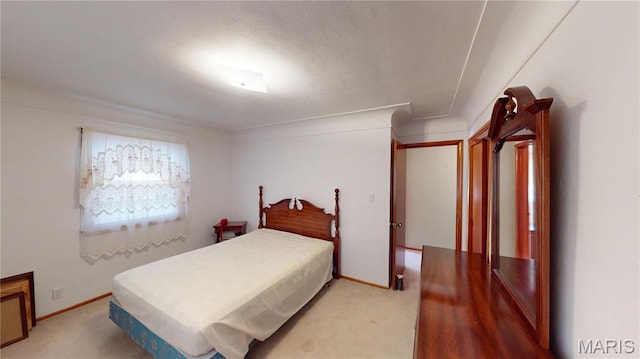 4645 S State Route 159, Glen Carbon, IL 62034 - bedroom featuring light carpet and baseboards