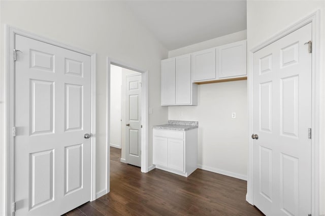 2491 Chukka Dr, Eureka, MO 63025 - washroom with baseboards and dark wood finished floors