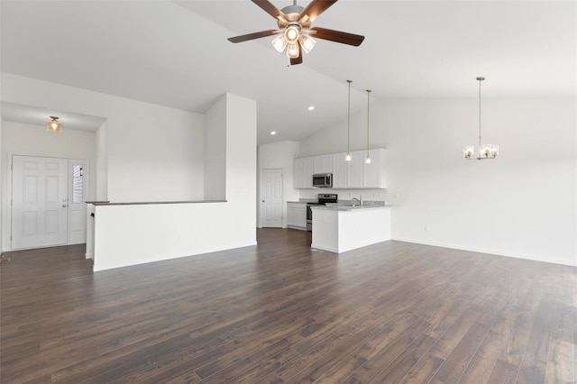 2491 Chukka Dr, Eureka, MO 63025 - unfurnished living room featuring a chandelier, ceiling fan, dark wood-style flooring, high vaulted ceiling, and a sink