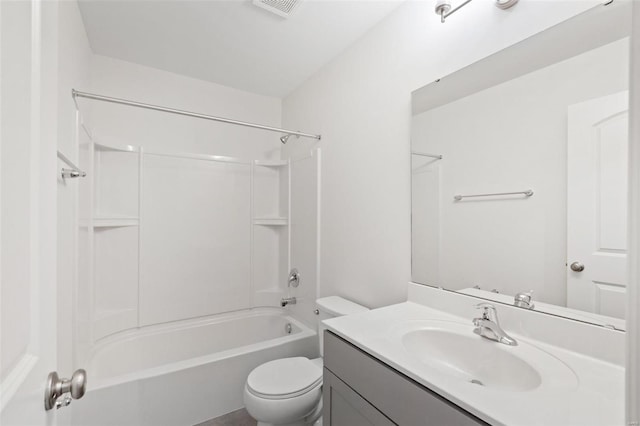 bathroom featuring toilet, vanity, and washtub / shower combination