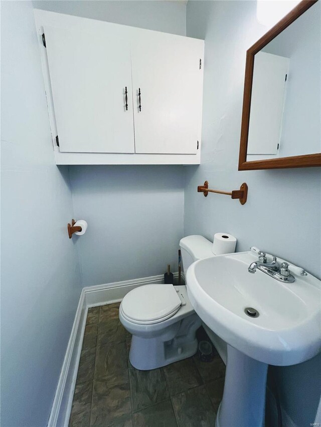 328 W Orrick, La Plata, MO 63549 - bathroom with toilet and a sink