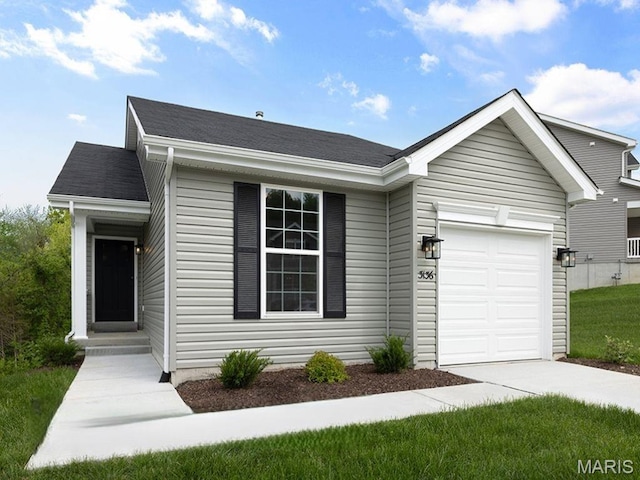 3136 White Pine Dr, Imperial, MO 63052 - ranch-style home featuring an attached garage, concrete driveway, and a shingled roof