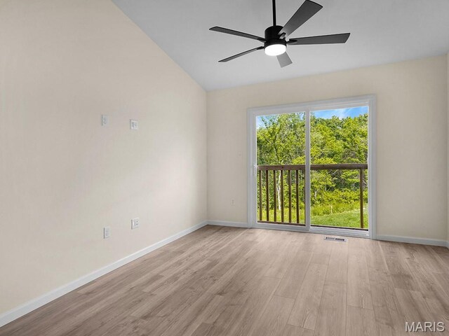 3136 White Pine Dr, Imperial, MO 63052 - unfurnished room with vaulted ceiling, wood finished floors, and a ceiling fan
