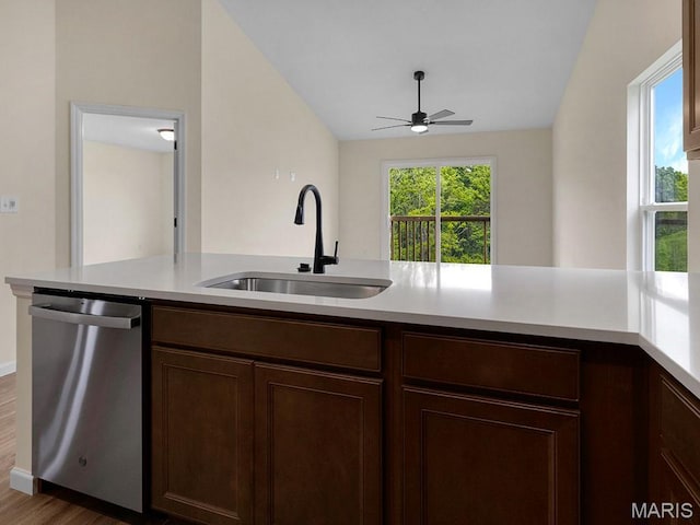 3136 White Pine Dr, Imperial, MO 63052 - kitchen featuring stainless steel dishwasher, ceiling fan, light countertops, lofted ceiling, and wood finished floors