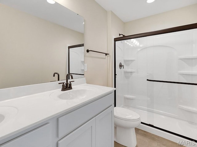 3136 White Pine Dr, Imperial, MO 63052 - full bathroom featuring double vanity, a shower with shower door, recessed lighting, and tile patterned flooring