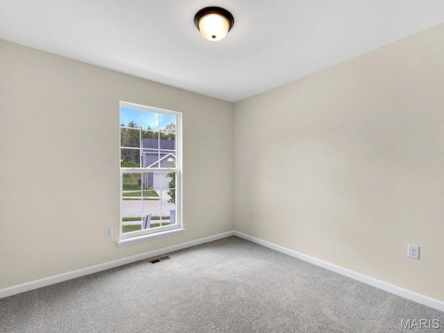 3136 White Pine Dr, Imperial, MO 63052 - carpeted empty room with baseboards