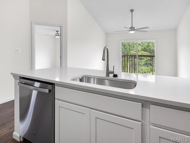 3128 White Pine Dr, Imperial, MO 63052 - kitchen featuring dishwasher, a ceiling fan, light countertops, dark wood-style flooring, and vaulted ceiling