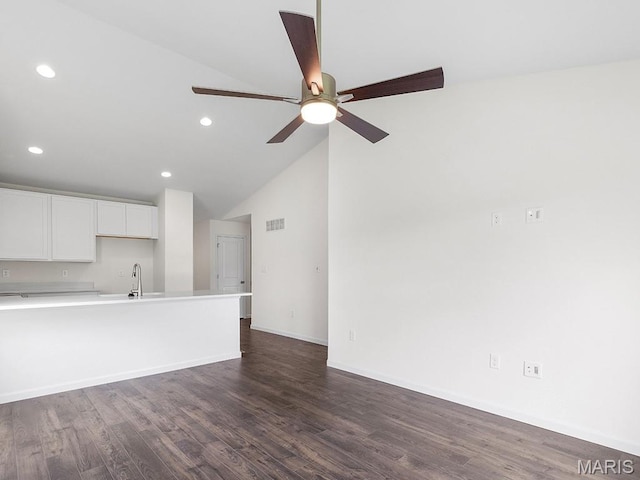 3128 White Pine Dr, Imperial, MO 63052 - unfurnished living room with dark wood-style floors, a ceiling fan, recessed lighting, and high vaulted ceiling