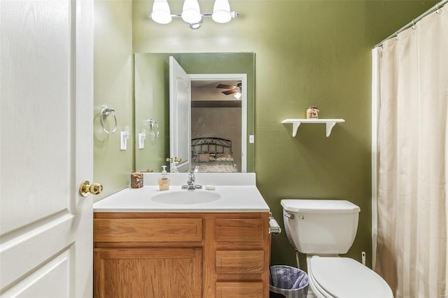 8041 Greystone Ln, Bonne Terre, MO 63628 - bathroom featuring vanity, toilet, and ceiling fan