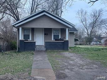 bungalow-style home with covered porch