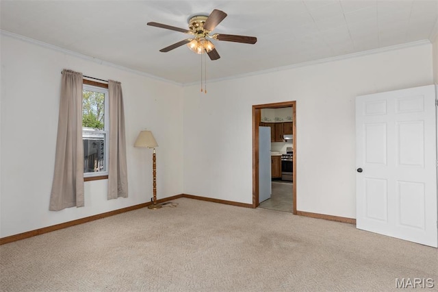 823 E Pearl St, Staunton, IL 62088 - unfurnished room featuring light carpet, crown molding, ceiling fan, and baseboards