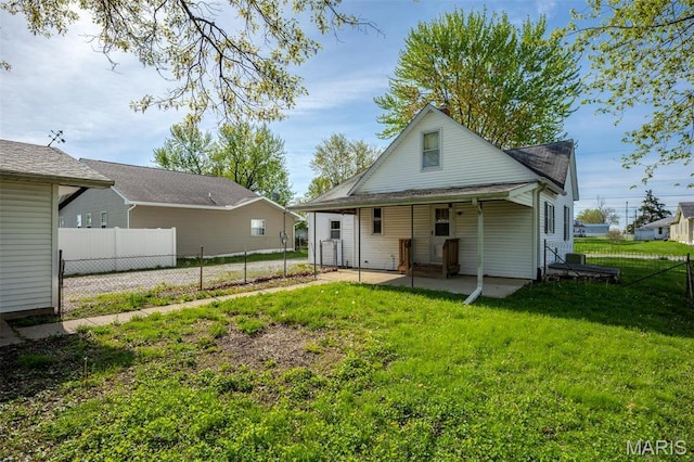 823 E Pearl St, Staunton, IL 62088 - back of house featuring a patio area