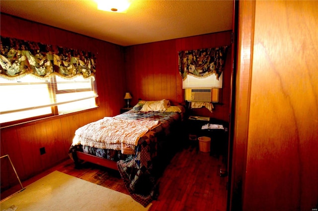 932 State Highway Hh, Isabella, MO 65676 - bedroom with wood finished floors, wood walls, and cooling unit