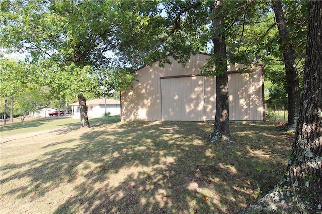 932 State Highway Hh, Isabella, MO 65676 - view of grassy yard with a pole building and an outbuilding