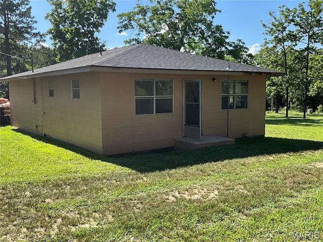 932 State Highway Hh, Isabella, MO 65676 - rear view of property featuring a shingled roof and a lawn