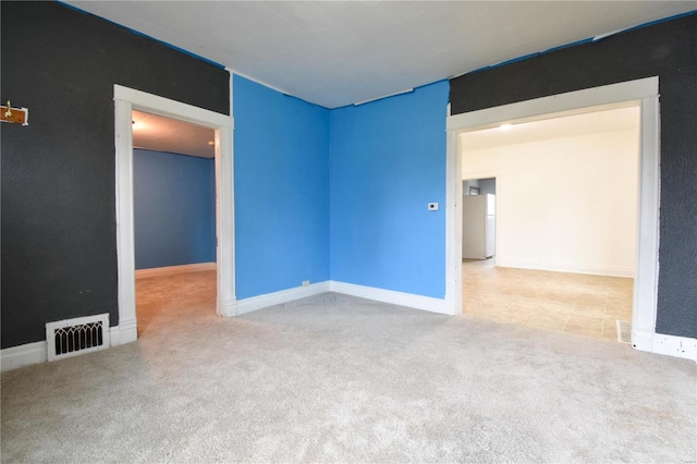 1103 S Madison St, Gillespie, IL 62033 - empty room featuring carpet flooring and baseboards
