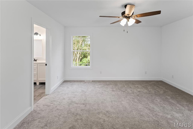 1127 Redwing Ct, Grafton, IL 62037 - spare room with carpet flooring and ceiling fan