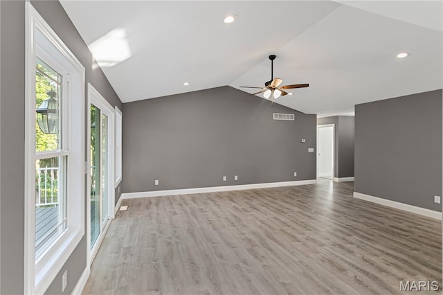 1127 Redwing Ct, Grafton, IL 62037 - spare room featuring ceiling fan, vaulted ceiling, light wood finished floors, and recessed lighting