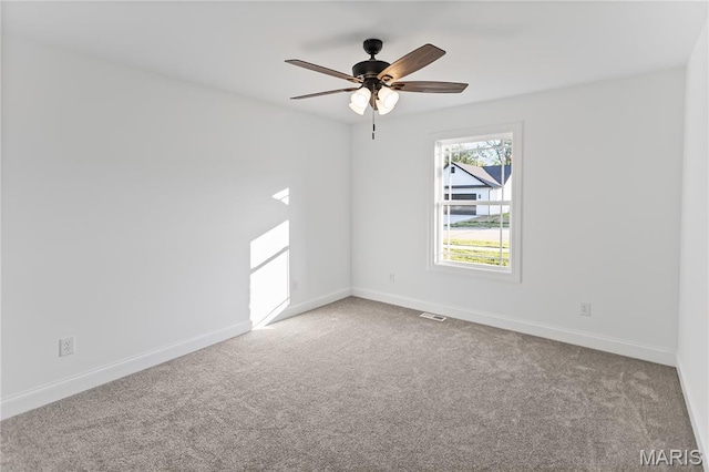 1127 Redwing Ct, Grafton, IL 62037 - spare room featuring carpet and a ceiling fan