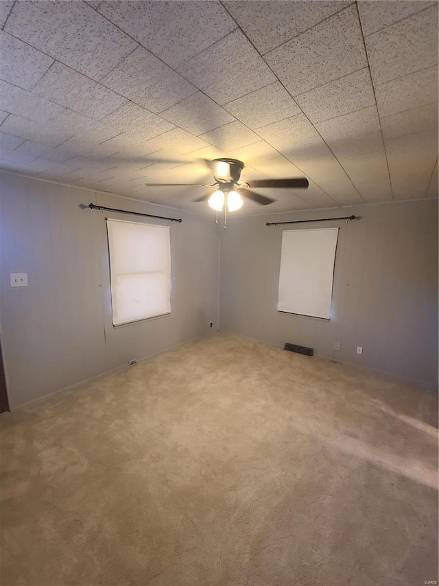2709 Ralph St, Granite City, IL 62040 - empty room with a ceiling fan and carpet floors