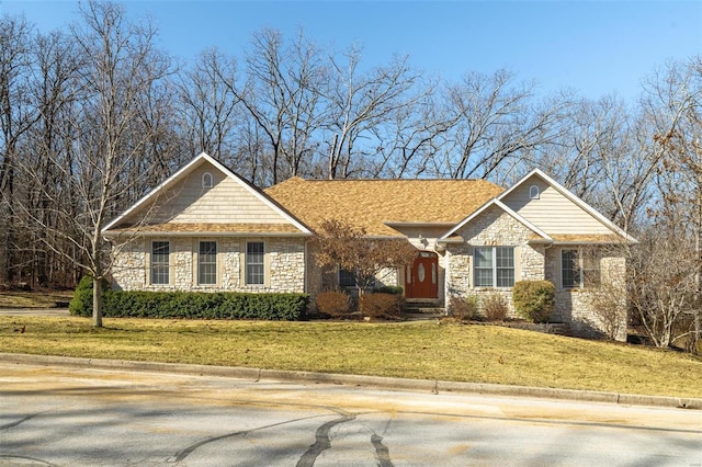 814 Marti Dr, Rolla, MO 65401 - view of front facade with stone siding and a front lawn