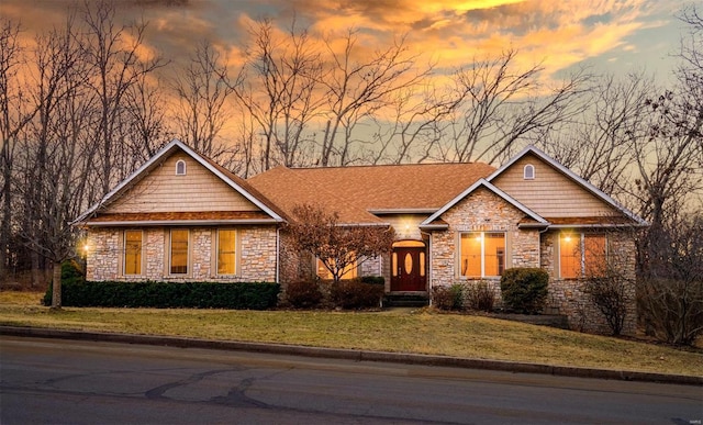 814 Marti Dr, Rolla, MO 65401 - craftsman-style house with stone siding and a yard