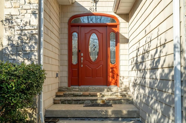 814 Marti Dr, Rolla, MO 65401 - property entrance featuring stone siding