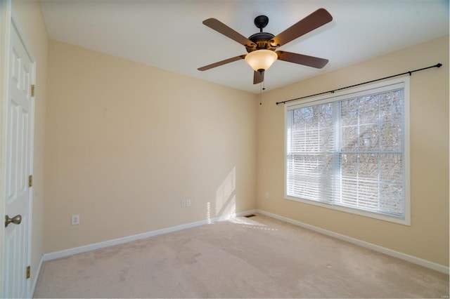 814 Marti Dr, Rolla, MO 65401 - carpeted empty room with baseboards and a ceiling fan