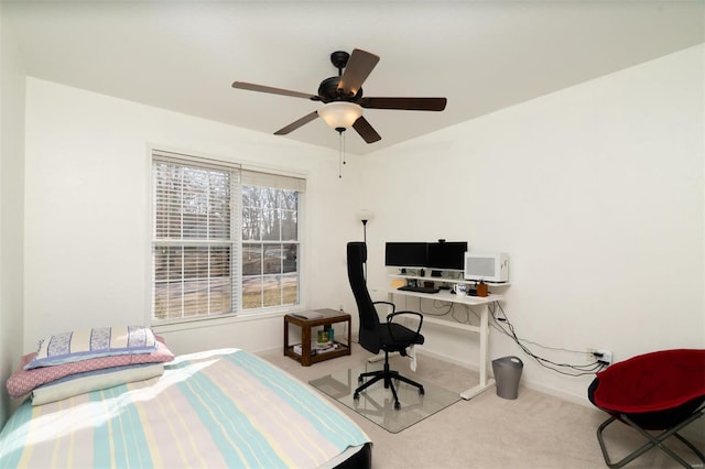 814 Marti Dr, Rolla, MO 65401 - bedroom with carpet, a desk, baseboards, and a ceiling fan