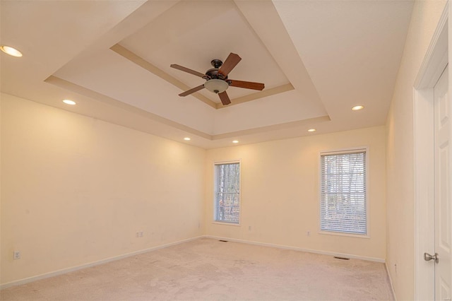 814 Marti Dr, Rolla, MO 65401 - empty room with light carpet, a raised ceiling, baseboards, a ceiling fan, and recessed lighting