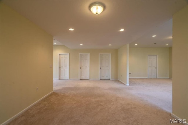 814 Marti Dr, Rolla, MO 65401 - unfurnished room featuring light carpet, baseboards, and recessed lighting