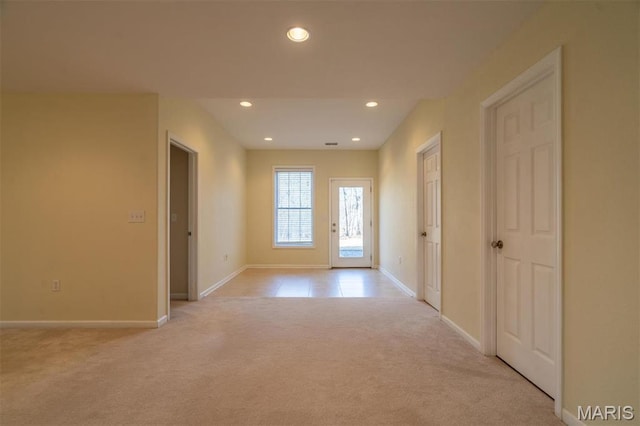 814 Marti Dr, Rolla, MO 65401 - unfurnished room with light colored carpet, baseboards, and recessed lighting