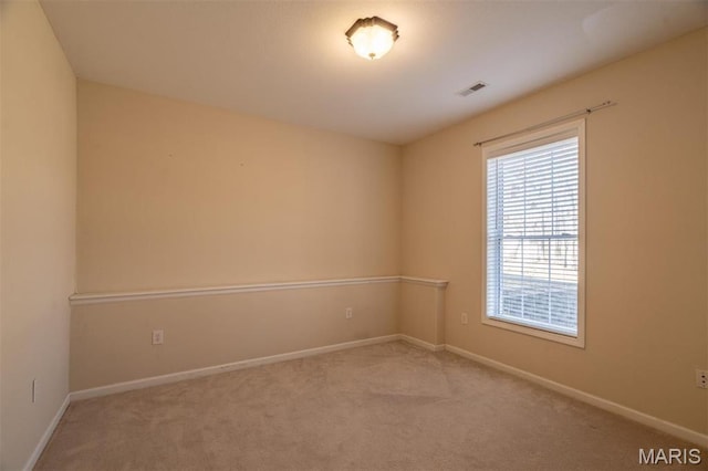 814 Marti Dr, Rolla, MO 65401 - spare room with carpet floors and baseboards