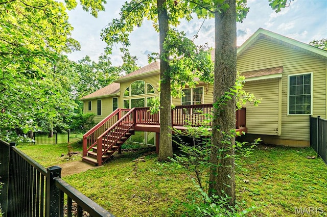 814 Marti Dr, Rolla, MO 65401 - back of house with a wooden deck and stairs