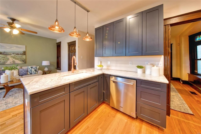3834 De Tonty St, Saint Louis, MO 63110 - kitchen with dishwasher, a sink, a peninsula, ceiling fan, and light wood-style floors