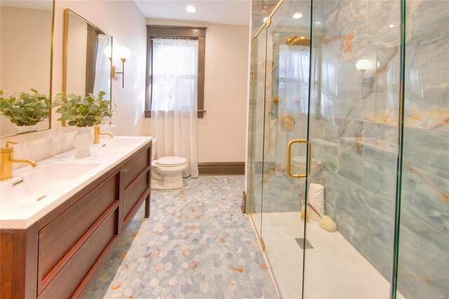 3834 De Tonty St, Saint Louis, MO 63110 - full bathroom with toilet, a shower stall, double vanity, and recessed lighting