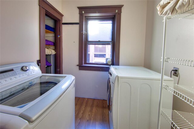 3834 De Tonty St, Saint Louis, MO 63110 - laundry area featuring independent washer and dryer and wood finished floors