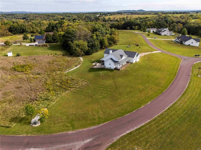 101 Lauren Grace Ct, Elsberry, MO 63343 - view of property location with a heavily wooded area