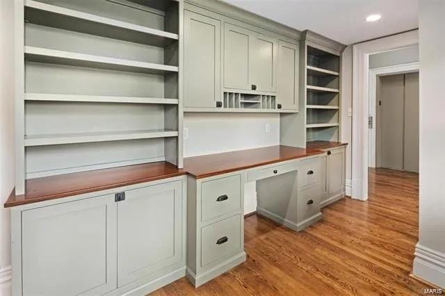 4969 Pershing Pl Unit 1, Saint Louis, MO 63108 - unfurnished office with built in desk, light wood-type flooring, and recessed lighting