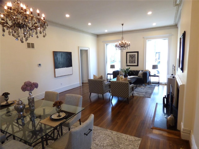 4969 Pershing Pl Unit 1, Saint Louis, MO 63108 - living room featuring a chandelier, wood finished floors, recessed lighting, ornamental molding, and baseboards