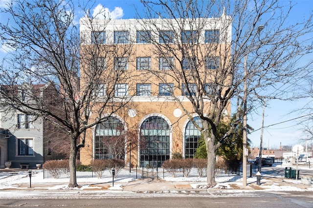 4901 Washington Blvd Unit 2C, Saint Louis, MO 63108 - snow covered property with fence