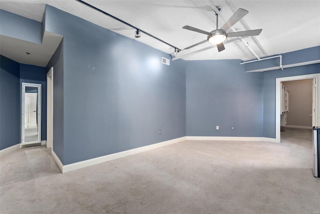 4901 Washington Blvd Unit 2C, Saint Louis, MO 63108 - carpeted spare room featuring a ceiling fan and baseboards