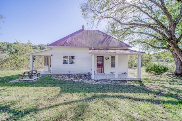 2251 County Road 6670, Salem, MO 65560 - view of front facade featuring a front yard, metal roof, and a porch