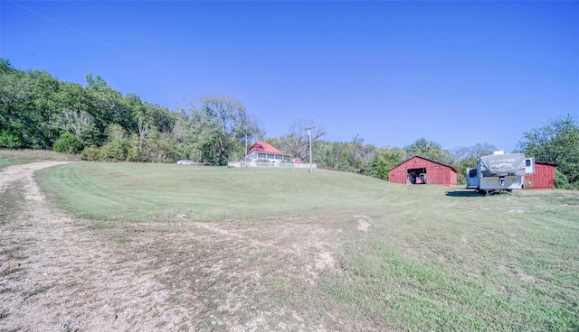 2251 County Road 6670, Salem, MO 65560 - view of grassy yard featuring an outdoor structure and a barn